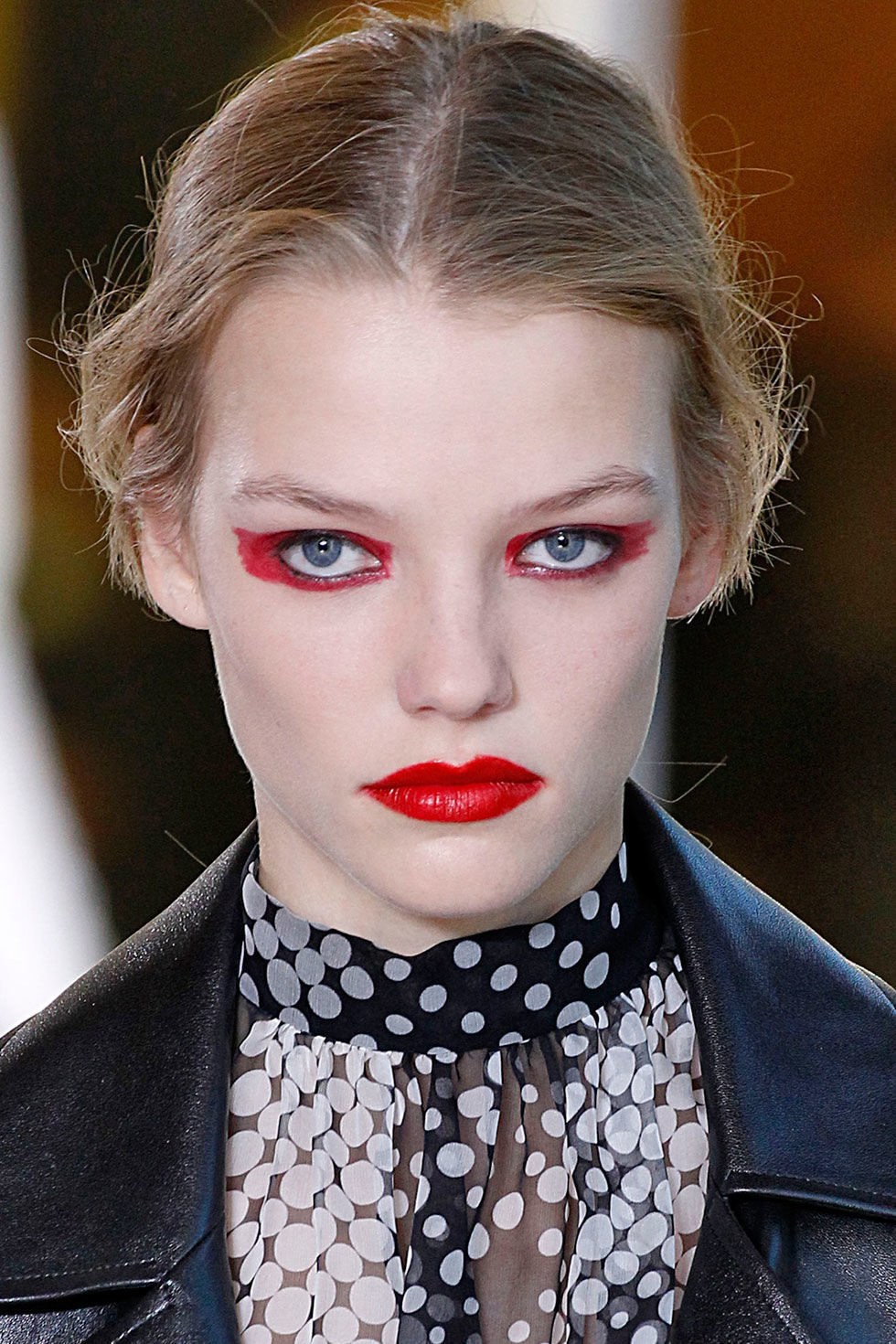 Worn by just four models, the hyper-pigmented red lip and eye look at Anthony Vaccarello punctuated a sea of otherwise bare faces. For a similar shade, try Lancôme L'Absolu Rouge in Rouge Amour.